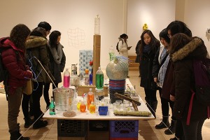 Students observe Tony Feher's work at the Bronx Museum 