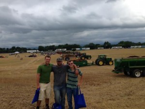 Hanging out at the North American Manure Expo with Isaac Cornell (left) and Andrew LeFever (right). Behind us are dry manure spreaders performing demonstrations for the large crowd of people (Spoiler alert for my next blog...)