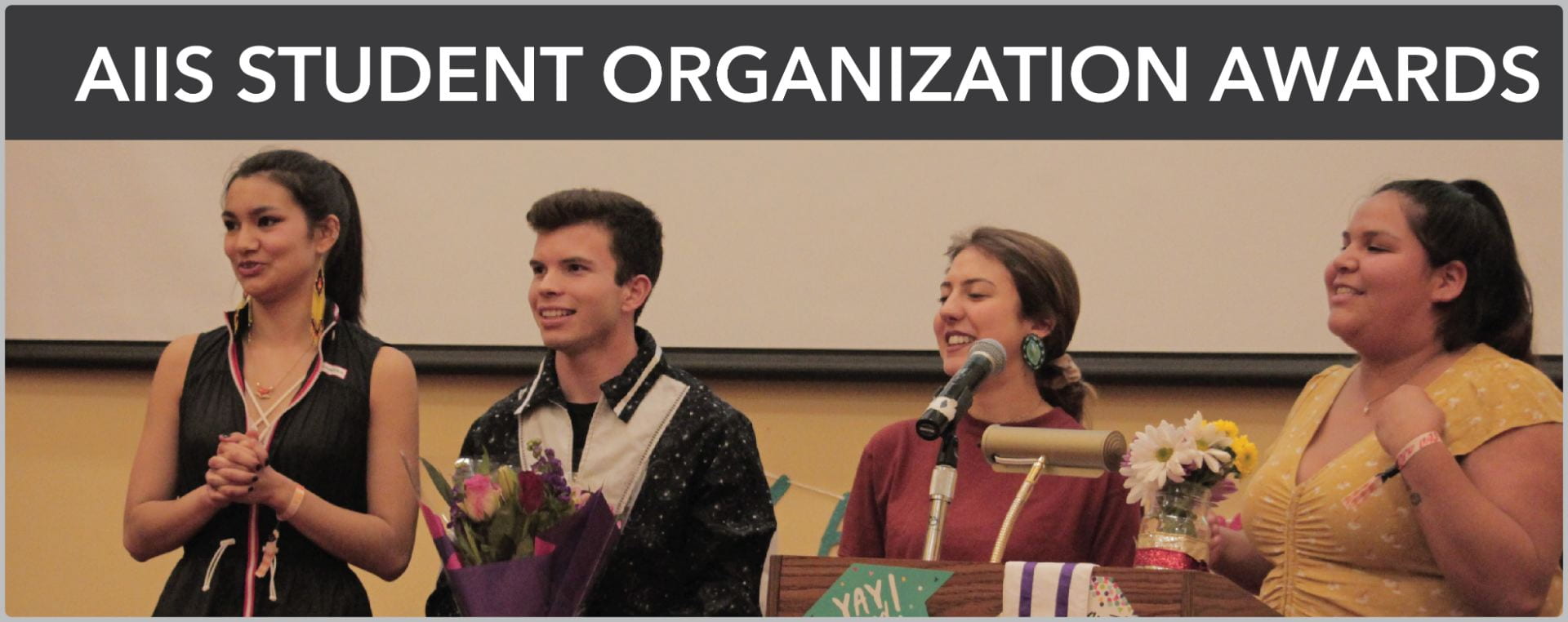 AIIS student organization awards banner with link to page