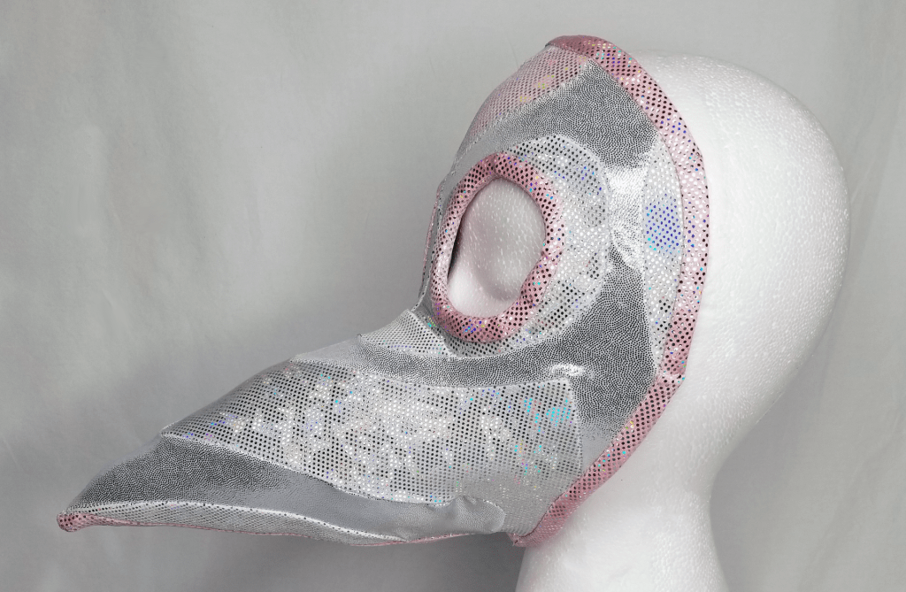 A silver beaked mask