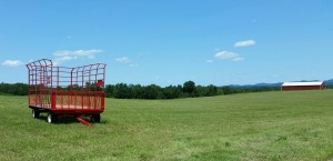 Empty hay wagon on a field