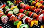 Picture of kabobs made with bright colored vegtables