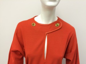Detail of jersey wool dress and neckline closures.