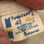 Tag from a Towncraft t-shirt. The tag says Towncraft® 40 Plus 50% Fortrel® Polyester 50% Pima Cotton. Penneys."