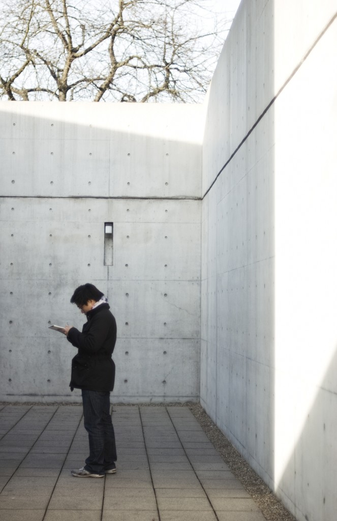Student Michael Lee in Tadao Ando's Conference Pavilion