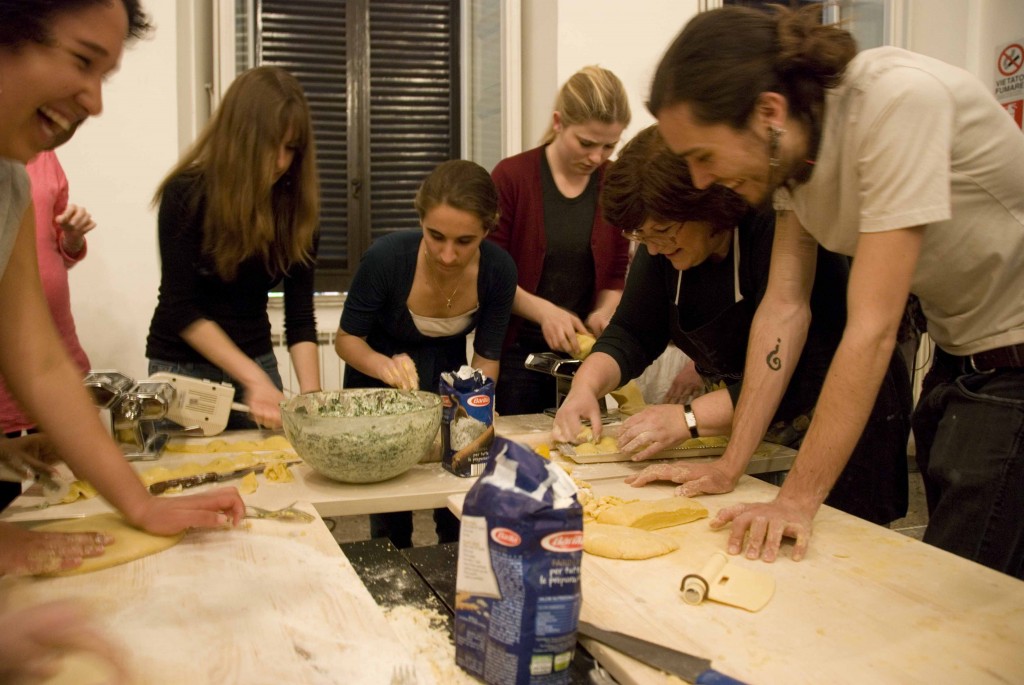 Students rolling dough