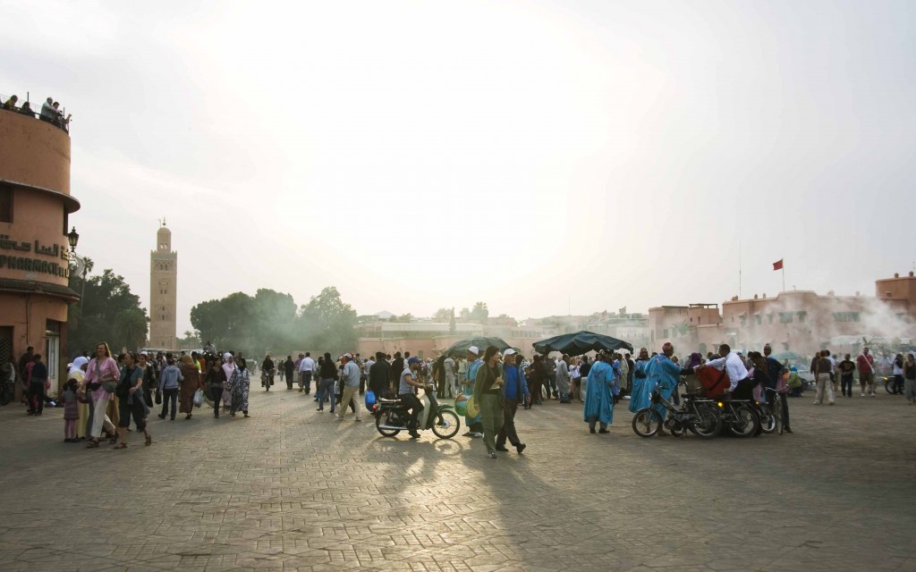 At the market square of Marrakech as the sun sets