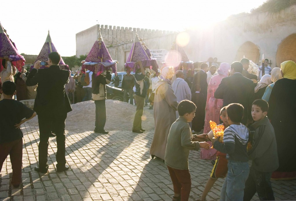A traditional muslim wedding taking place outside of the gates of Meknes