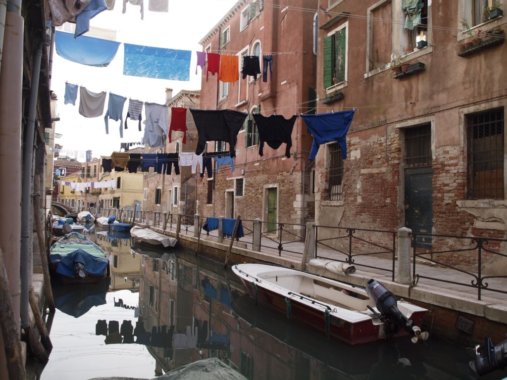 Clothes air-drying over canal
