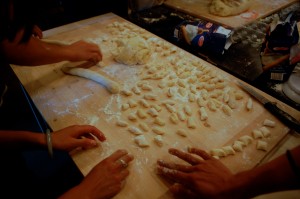 Lots of hands for lots of gnocchi!