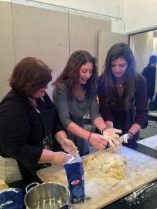 Anna Rita demonstrates how to prepare the dough for kneading