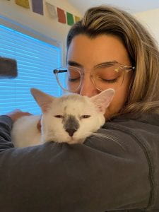 Dr. Emily Boccia, '22/'23 Maddie's®Shelter Medicine Intern with her foster-to-adopt kitty-- "Boop"