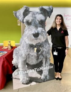 Dr. Emily Boccia with Maddie's cardboard dog 