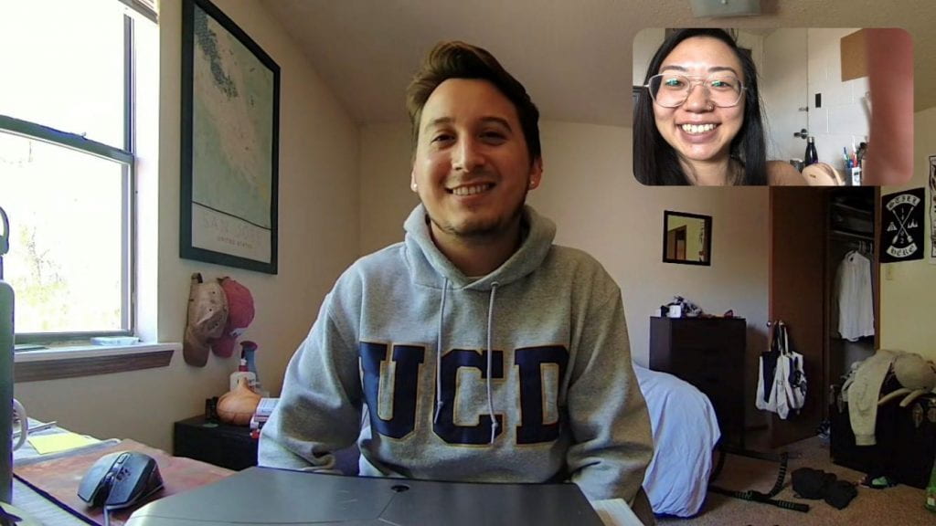 video conference call still of two people smiling