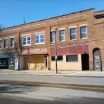 shuttered stores in a downtown area