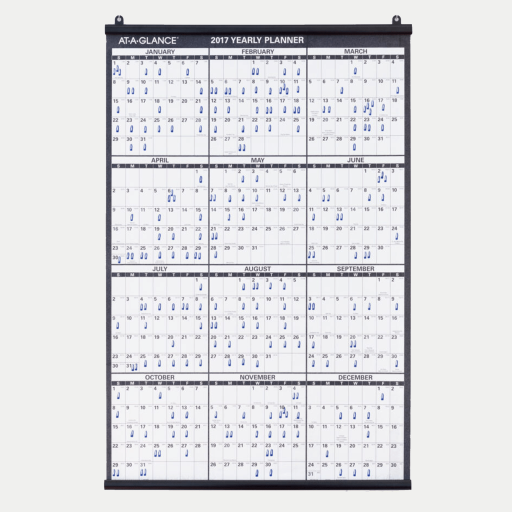 Image of calendar with blue icons on specific dates