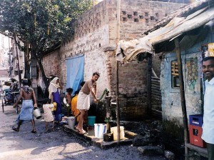 A water pump in the slums of Calcutta. Rick & Irene Butler, Flickr.