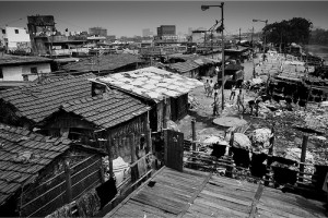 A basti slum and the Calcutta skyline. Roberto Bianconi, Flickr.