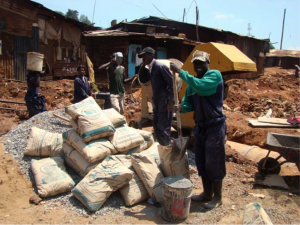 The KENSUP program in action in Kibera: residents are taking part of the slum-upgrading program. (Image from Nextcity.org)