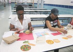 Two women looking at nutrition information