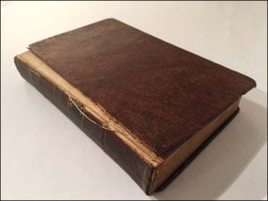 leather bound book with detached covers