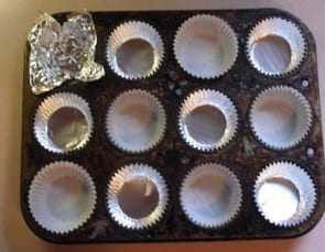 Cupcake tin with sample homemade aluminum foil liner