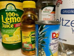 Ingredients to make Sparkling Punch: lemon juice, apple juice, pineapple juice, orange juice and seltzer water.