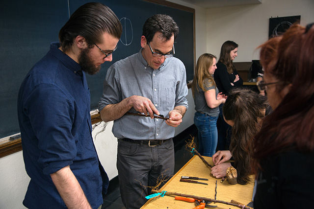 Peck teaches grafting to students in Ecological Orchard Management (PLHRT 4450).