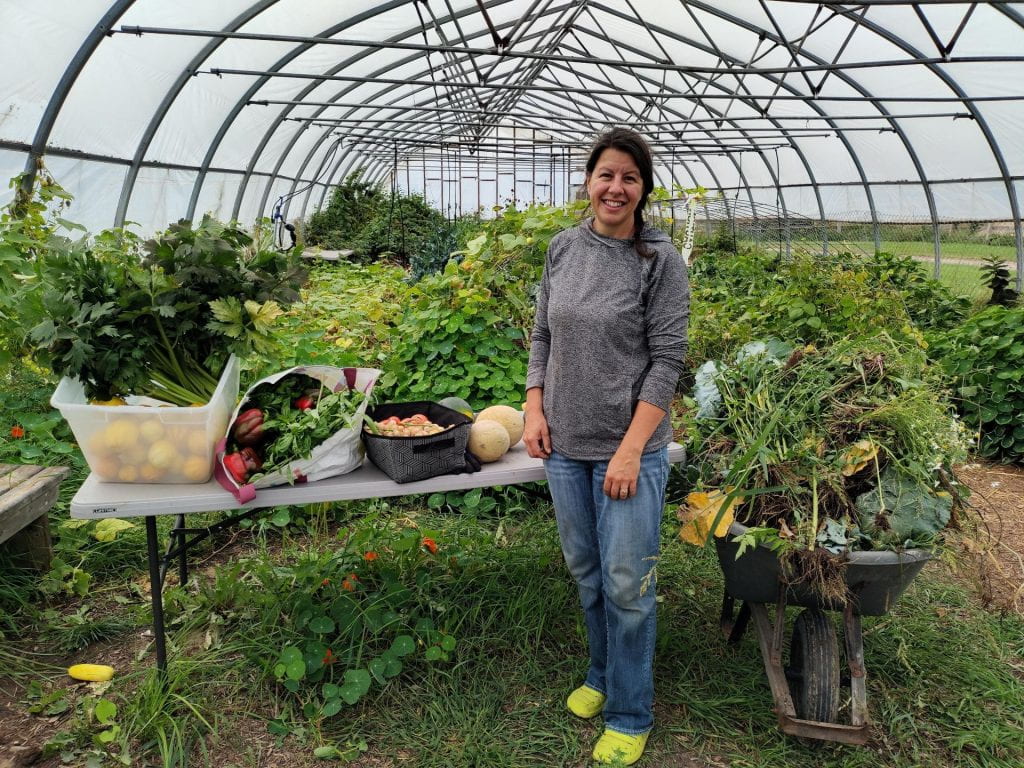 MGV trainee with her harvest for a local neighborhood center