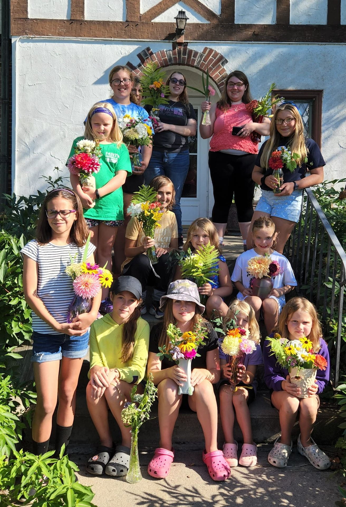 Ogdensburg Youth Garden Club members with bouquets they made