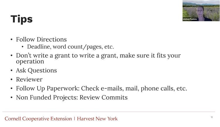A presentation slide listing tips for writing grants. 
