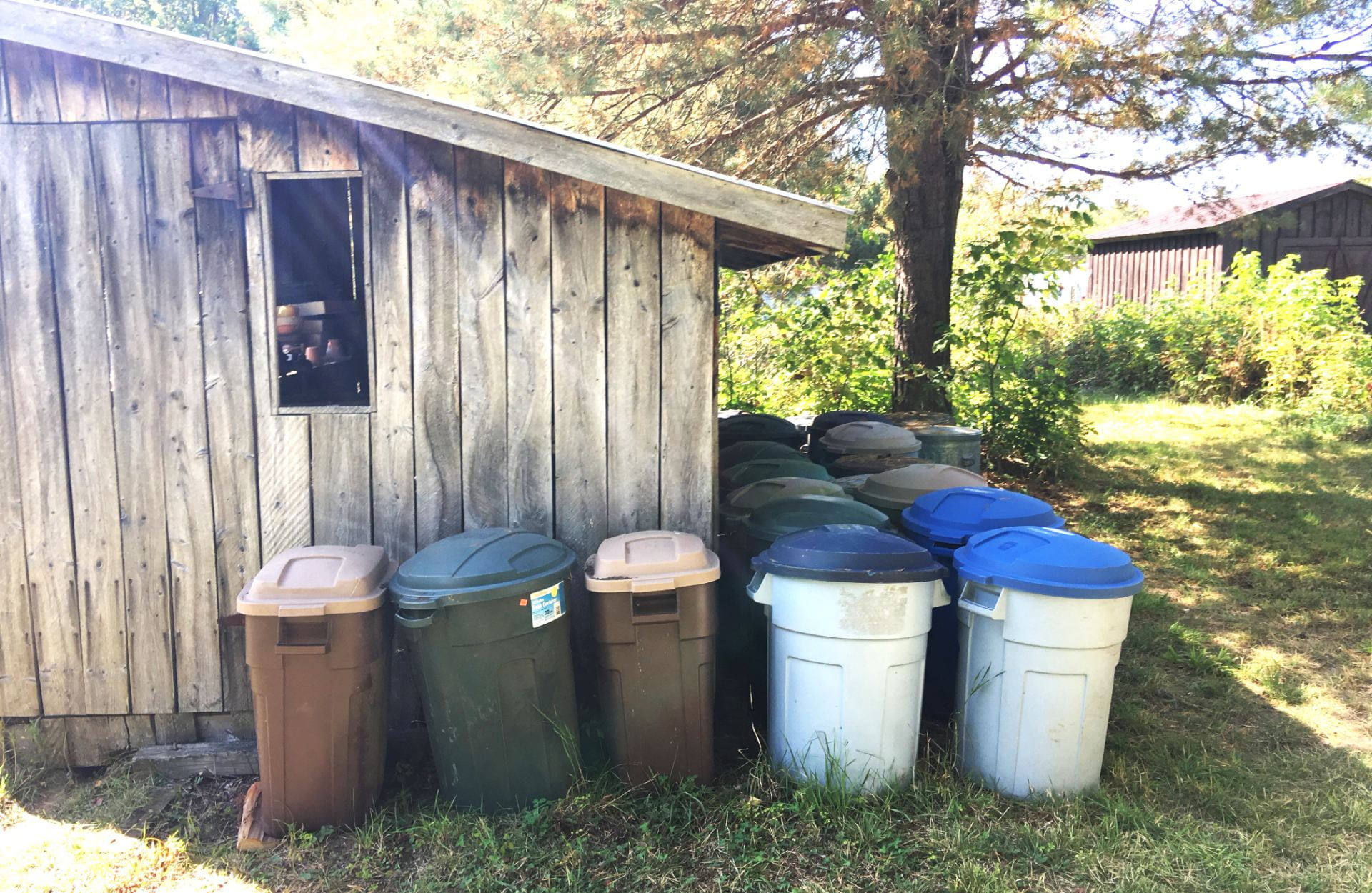 Finished compost stored in garbage cans