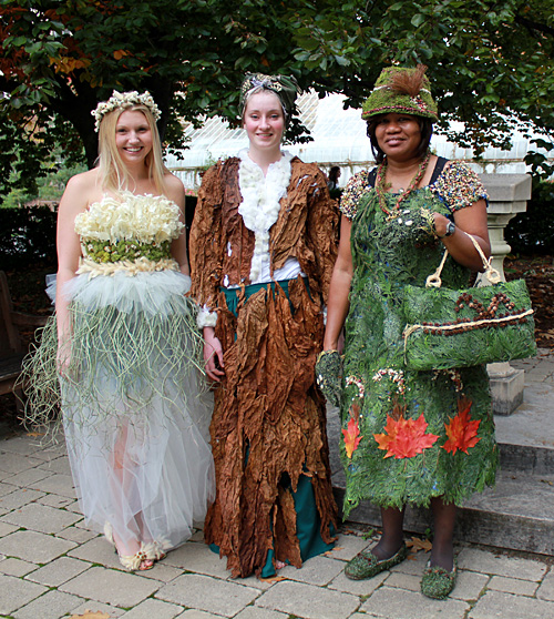 Art of Horticulture students and their creations: Jasmine LaCoursiere ’14, wedding dress fashioned from bleached oak leaves, mosses, and grass leaves and seedheads.  Eva Johnson ’15, globally important crops featuring tobacco and banana leaves, cotton and coffee beans.  Shiela Gordon-Smith ’14, Queen Mother outfit made from a diversity of evergreens, seeds, grass, and maple leaves.