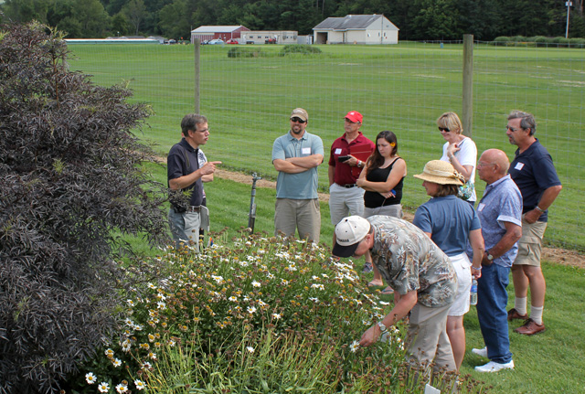 Brian Eshenaur, Ornamentals IPM Extension Area Educator with the NYSIPM Program, makes a point about insect and disease problems in the landscape.