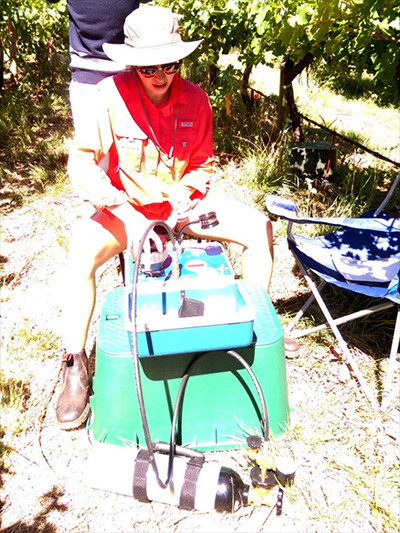Kallas measuring midday water potential during a 40-degree C (104 F) heatwave last week.