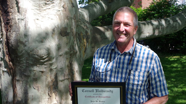John Keeton in the clonal repository has worked in many roles of caring for horticultural crops in his 25 years of service.