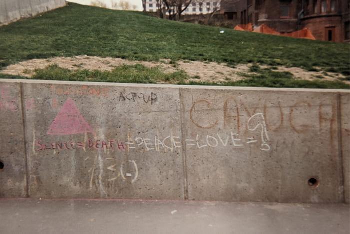 Graffiti from the “take back the wall” event on April 15, 1990. The slogan “silence=death” and the pink triangle are both associated with the ACT UP movement.
