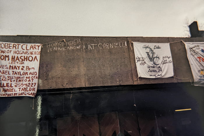 Graffiti above the Cornell store reminding students that “Homophobia is alive and well at Cornell.”