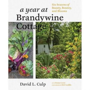 Book Cover: A Year at Brandywine Cottage - Photos: Harvested beets, radishes, and peas / A lush garden with a white cottage in in the background