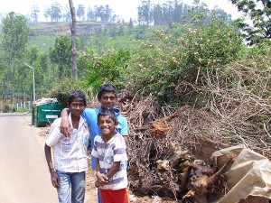 This group of boys lives in the first household we visited during the day. Behind them are piles and piles of biowaste stacked by a panchayat dumpster that has not been emptied in the 2 months since its installation. Unfortunately, waste is littered all around the overfull dumpster as if it is not there at all.
