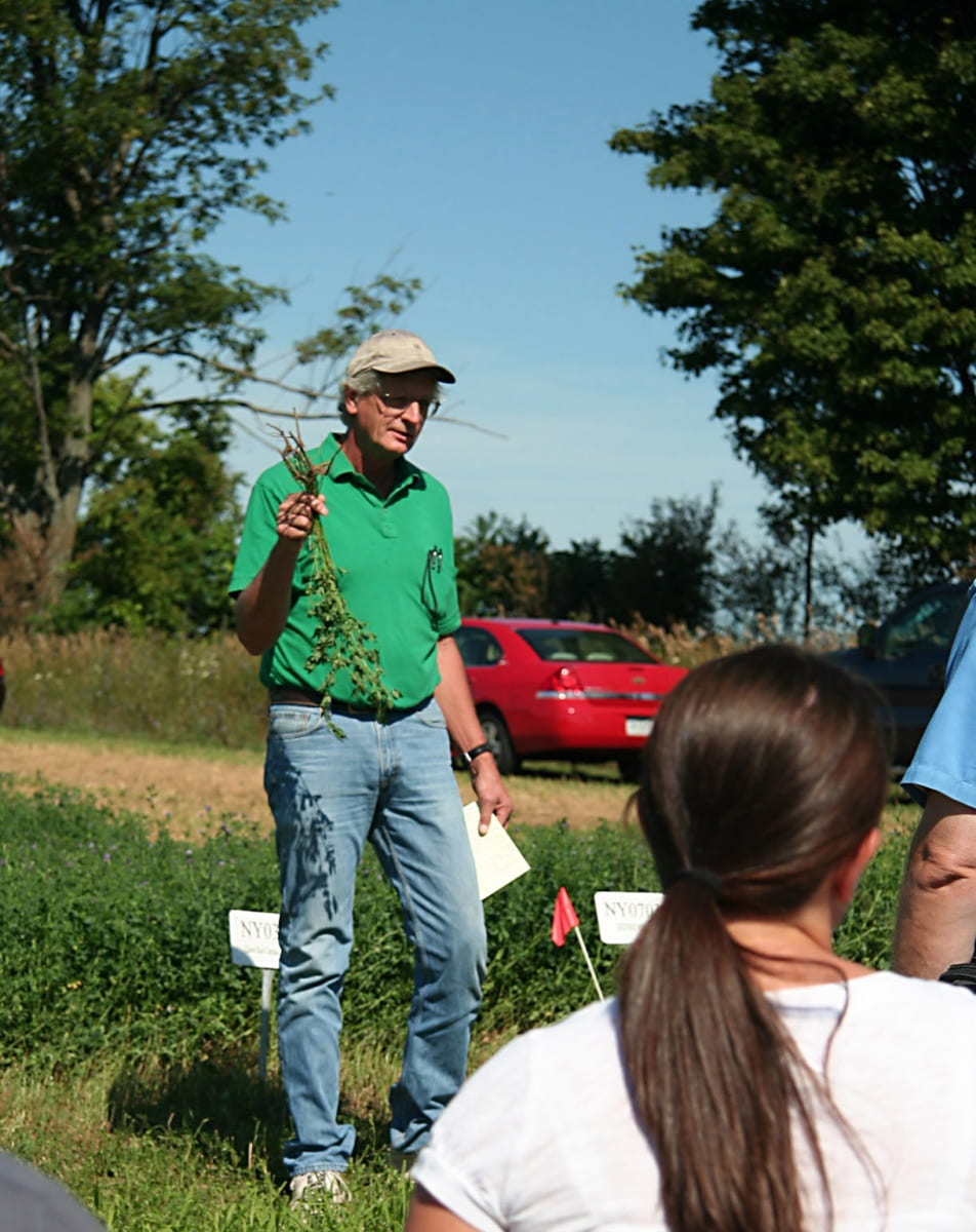 Dr. Shields is seen in this photo as he speaks with a group of growers.