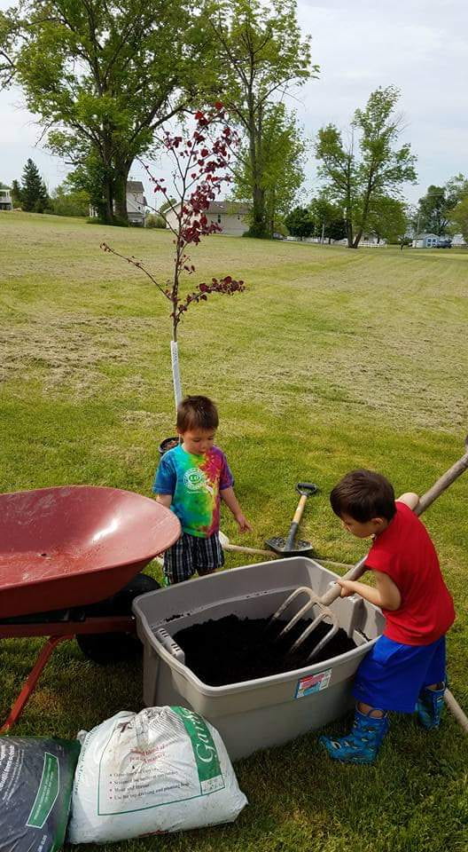 Photo of kids planting