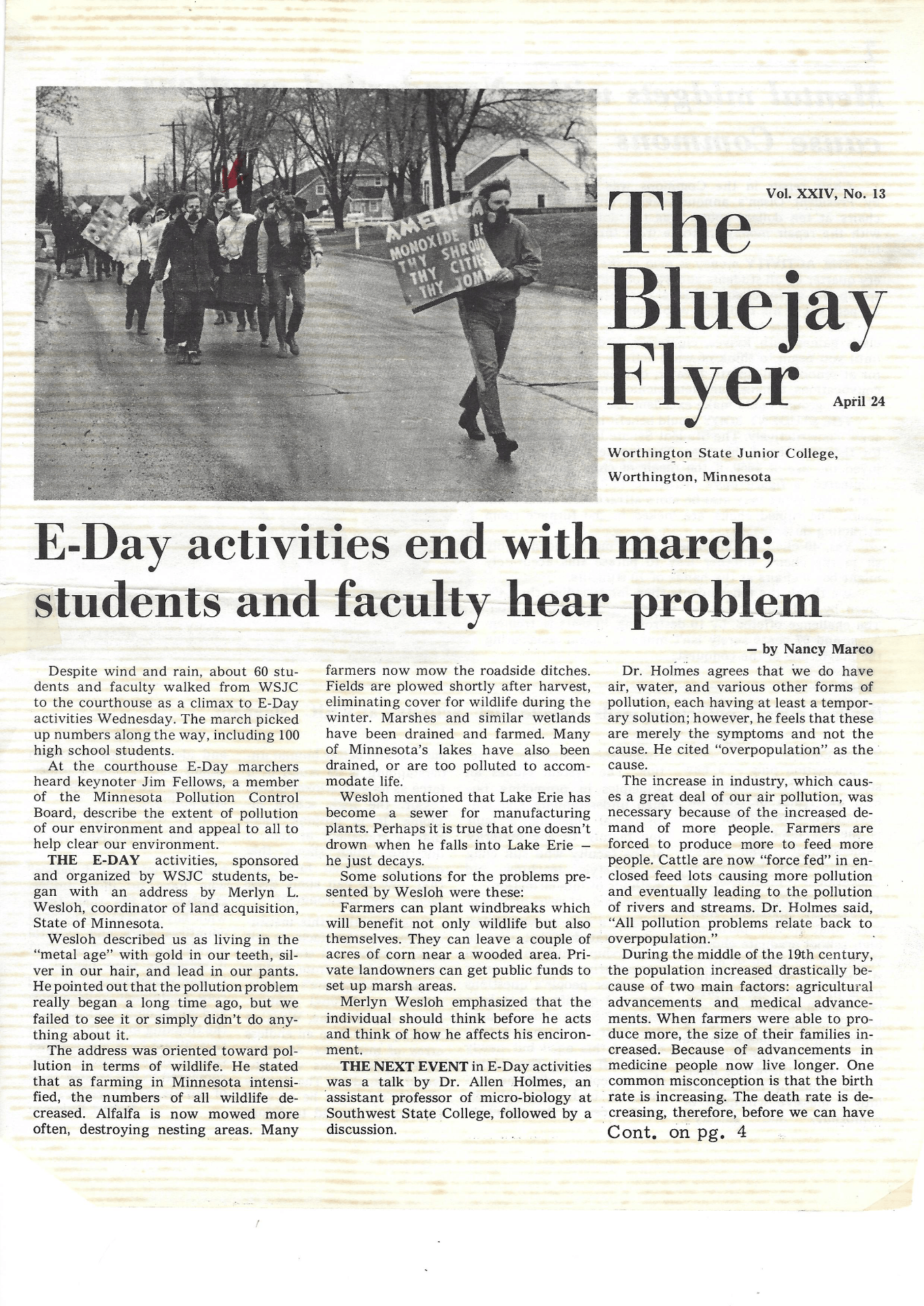 scanned newspaper article about a march on a college campus