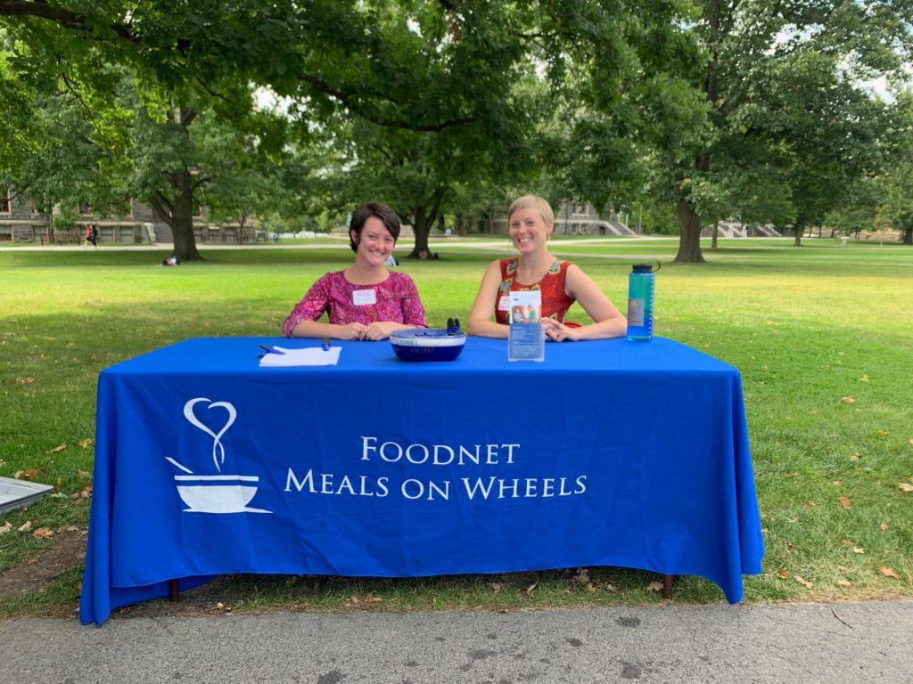 Andreina Martin, Cornell MPH '19 (left), tabling for Foodnet Meals on Wheels with Grace Johnston, Social Work student from Binghamton University (right).