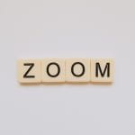 Zoom spelled out with Scrabble pieces
