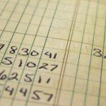 numbers on ledger paper