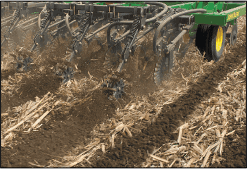 Agricultural field with strip tillage