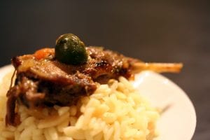 duck leg with olive on rice