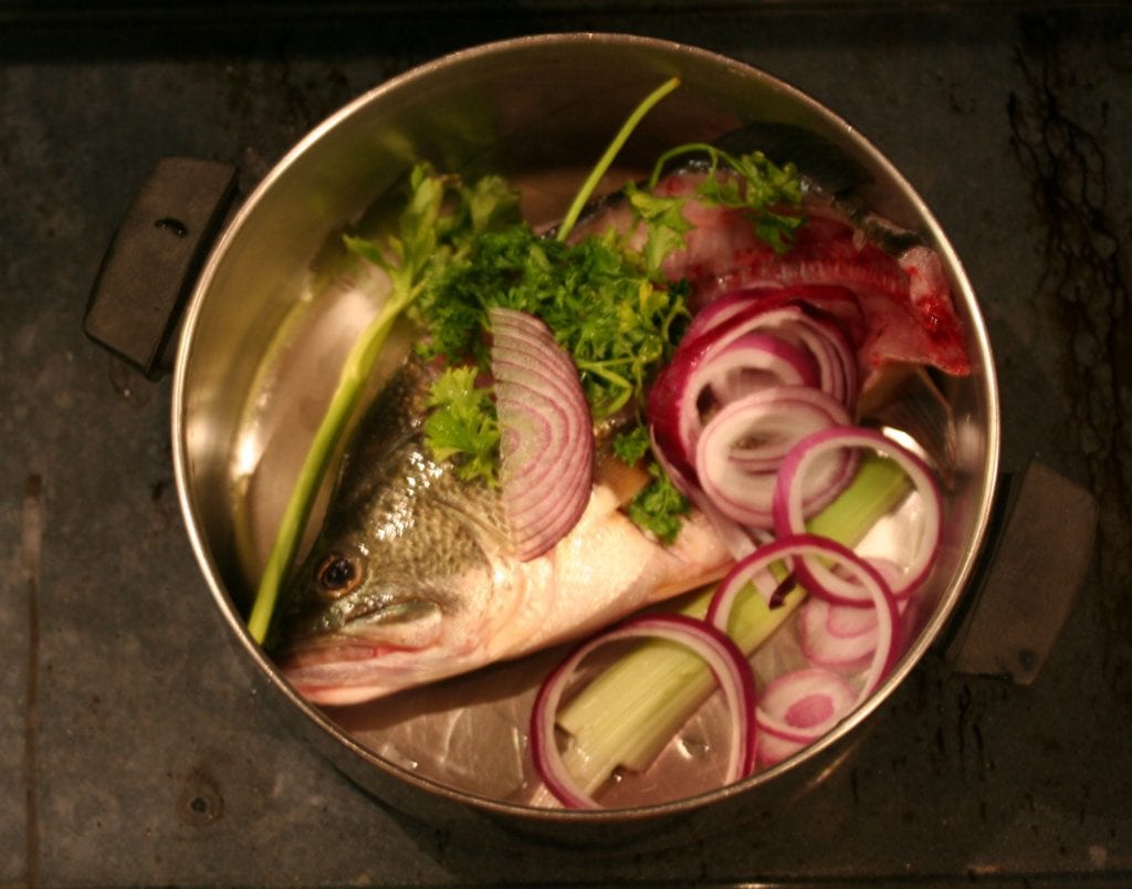in stock pot with onion and parsley